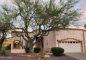 Enjoy beautiful mountain views from this private east facing for sale in Oro Valley Arizona Pima County County on GolfHomes.com