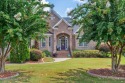 This custom-built brick home offers 2,970 sq.ft. of living space for sale in Leland North Carolina Brunswick County County on GolfHomes.com