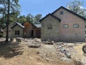 Brand new construction on #15 Diamante Golf Course! This for sale in Hot Springs Village Arkansas Saline County County on GolfHomes.com