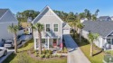 Located in the prestigious gated community of Grande Dunes North for sale in Longs South Carolina Horry County County on GolfHomes.com