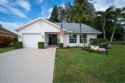 This gorgeous golf-view home has been totally renovated in 2024 for sale in Jupiter Florida Palm Beach County County on GolfHomes.com