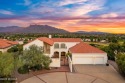 This architectural jewel captures sweeping views of the Catalina for sale in Tucson Arizona Pima County County on GolfHomes.com