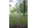 This cozy lot sits in a quiet, friendly subdivision on a dead for sale in Roscommon Michigan Roscommon County County on GolfHomes.com