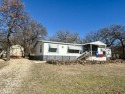 Nestled in the gated community of Nocona Hills sitting on almost for sale in Nocona Texas Montague County County on GolfHomes.com