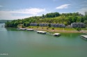 Carefree, lakefront living!  Take in the views from this for sale in Lafollette Tennessee Campbell County County on GolfHomes.com