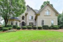 Stunning 5 bed/5.5 bath MASTER ON MAIN home on a private GOLF for sale in Suwanee Georgia Gwinnett County County on GolfHomes.com