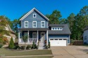 Rocking chair front porch welcomes you to this beautifully for sale in Holly Springs North Carolina Wake County County on GolfHomes.com