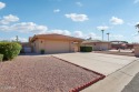 Excellent single-level home on a prime corner lot in the for sale in Sun Lakes Arizona Maricopa County County on GolfHomes.com