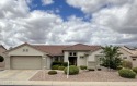 HUGE PRICE REDUCTION!!!! Beautiful expanded Verbena model in the for sale in Surprise Arizona Maricopa County County on GolfHomes.com