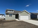 Step into Modern Elegance at Spring Meadows! This beautiful for sale in Waukee Iowa Dallas County County on GolfHomes.com