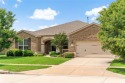 Discover the epitome of active adult living in this stunning for sale in Frisco Texas Denton County County on GolfHomes.com
