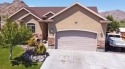 Live where comfort meets golf course views! This 4-bedroom for sale in West Wendover Nevada Elko County County on GolfHomes.com