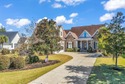 Coastal elegance meets Lowcountry charm in this exceptional for sale in Pawleys Island South Carolina Georgetown County County on GolfHomes.com