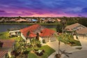 Welcome to your dream LAKEFRONT home with stunning SUNSET VIEWS! for sale in North Port Florida Sarasota County County on GolfHomes.com
