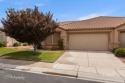 Welcome home to this three bedroom, 2 bath 1690 SF townhome for sale in Mesquite Nevada Clark County County on GolfHomes.com