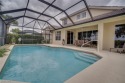 Beautiful home in golfing community located behind the gates of for sale in Fort Myers Florida Lee County County on GolfHomes.com