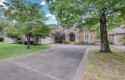 Classic and stately Chenal home with its brick and stone for sale in Little Rock Arkansas Pulaski County County on GolfHomes.com