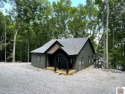 Discover lakeside living in this brand new lake house, perfectly for sale in Cadiz Kentucky Trigg County County on GolfHomes.com
