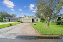 Charming 3BR/2BA home in Oakwood Golf Club! Built in 2002, this for sale in Lake Wales Florida Polk County County on GolfHomes.com