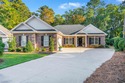 Welcome to this stunning all-brick home tucked away on a quiet for sale in Pawleys Island South Carolina Georgetown County County on GolfHomes.com