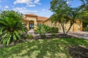 This stunning, fully REMODELED barrel tile roof Verona model for sale in Poinciana Florida Polk County County on GolfHomes.com