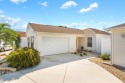 Welcome to your delightful courtyard villa in the heart of The for sale in The Villages Florida Sumter County County on GolfHomes.com