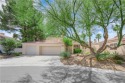 Welcome to 5205 Coral Glow, a stunning residence nestled within for sale in Las Vegas Nevada Clark County County on GolfHomes.com