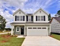 Welcome to the Columbia plan by Windsor Homes in Bell Meadows for sale in Winnabow North Carolina Brunswick County County on GolfHomes.com
