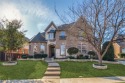 This charming Drees Custom Home, built Coyote Ridge, has it all for sale in Carrollton Texas Denton County County on GolfHomes.com