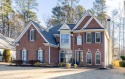 Gorgeous brick front home in the golf community of Bradshaw Farm for sale in Woodstock Georgia Cherokee County County on GolfHomes.com