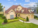 Absolutely gorgeous, two-story pool home with pristine Lake for sale in Mount Dora Florida Lake County County on GolfHomes.com