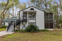 This charming end-unit condo in Derby Downs offers a peaceful for sale in Ocala Florida Marion County County on GolfHomes.com