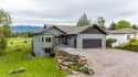 Overlooking the golf course, there are breathtaking views of the for sale in Polson Montana Lake County County on GolfHomes.com