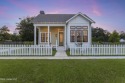 Located in the highly sought-after golf cart district of for sale in Ocean Springs Mississippi Jackson County County on GolfHomes.com
