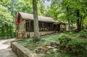 ''Welcome Home'' This Hearthstone designed Menonite quality log for sale in Crossville Tennessee Cumberland County County on GolfHomes.com