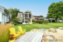 Welcome to your dream waterfront home nestled along the shores , Michigan
