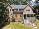 In the heart of Chastain Park, this exquisite Hamptons-inspired for sale in Atlanta Georgia Fulton County County on GolfHomes.com
