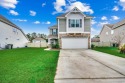 Step inside this beautiful home and be greeted by a charming for sale in Myrtle Beach South Carolina Horry County County on GolfHomes.com