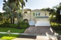 This Egret Lakes estate home offers 5 bedrooms/ 4.5 baths and a for sale in West Palm Beach Florida Palm Beach County County on GolfHomes.com