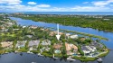 Experience waterfront living at its finest in this rare for sale in Jupiter Florida Palm Beach County County on GolfHomes.com