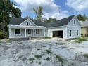 Welcome to 1541 Grandiflora Drive, a stunning new construction for sale in Leland North Carolina Brunswick County County on GolfHomes.com