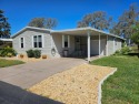 REDUCED Excellent opportunity. This is a 2-bedroom 2 bath with for sale in Zephyrhills Florida Pasco County County on GolfHomes.com
