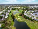 Welcome to this first floor condo unit, with quick and easy for sale in Tamarac Florida Broward County County on GolfHomes.com