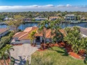 Welcome to your stunning and luxurious executive waterfront for sale in St. Petersburg Florida Pinellas County County on GolfHomes.com