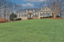 Nestled along the 10th hole of the Royal Lakes Golf Course, this for sale in Flowery Branch Georgia Hall County County on GolfHomes.com