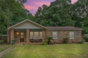Welcome to this charming 1,530 square foot brick and slab, low for sale in Mobile Alabama Mobile County County on GolfHomes.com