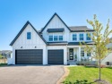 Step into this stunning 2022-built two-story gem that offers for sale in Dayton Minnesota Hennepin County County on GolfHomes.com