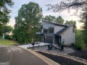 Mountain Modern! Nestled between the 12th and the 8th tee boxes for sale in Helen Georgia White County County on GolfHomes.com