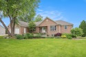 This executive ranch-style home has been stylishly updated and for sale in Byron Center Michigan Kent County County on GolfHomes.com