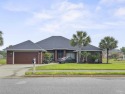 Custom built waterfront home, located in a desired gated golf for sale in Milton Florida Santa Rosa County County on GolfHomes.com